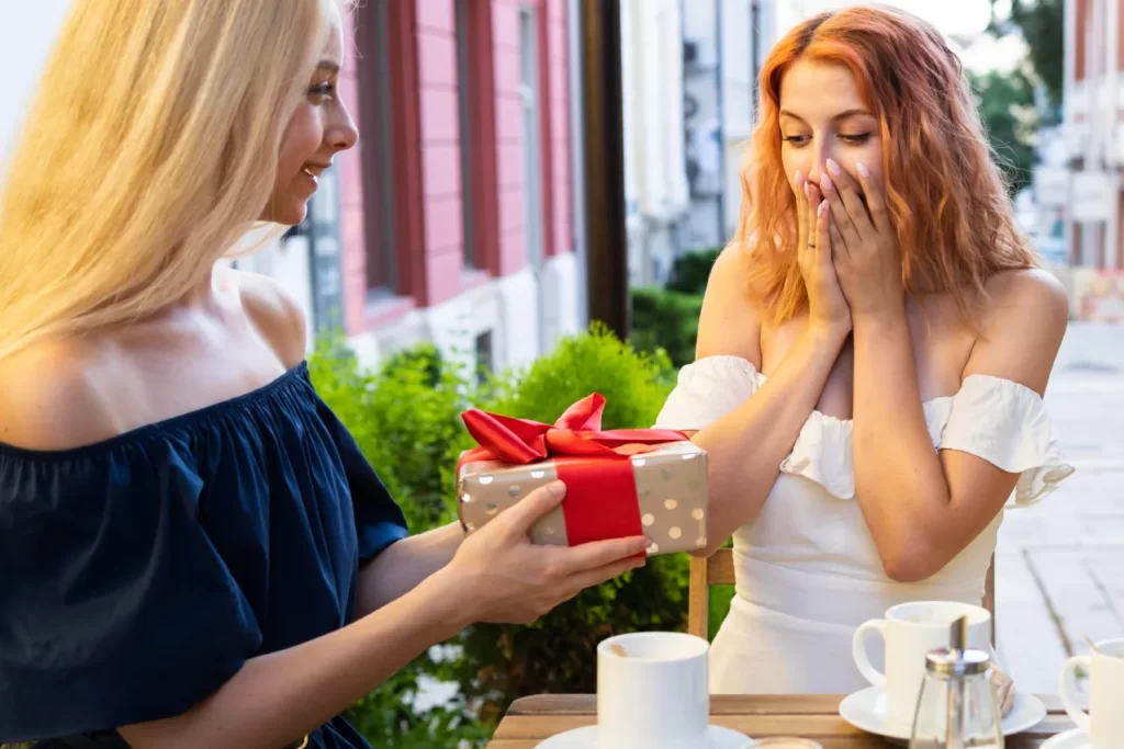 A bride using the coffee date bridesmaid proposal ideas