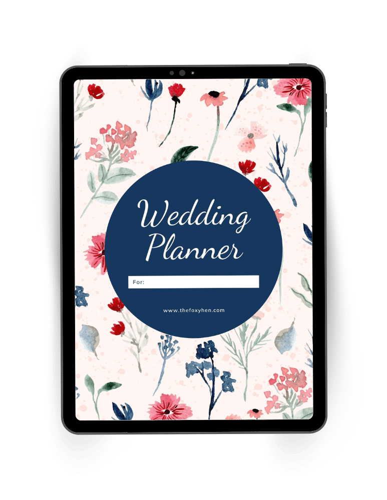 The foxy hen free printable wedding planner shown on a tablet screen