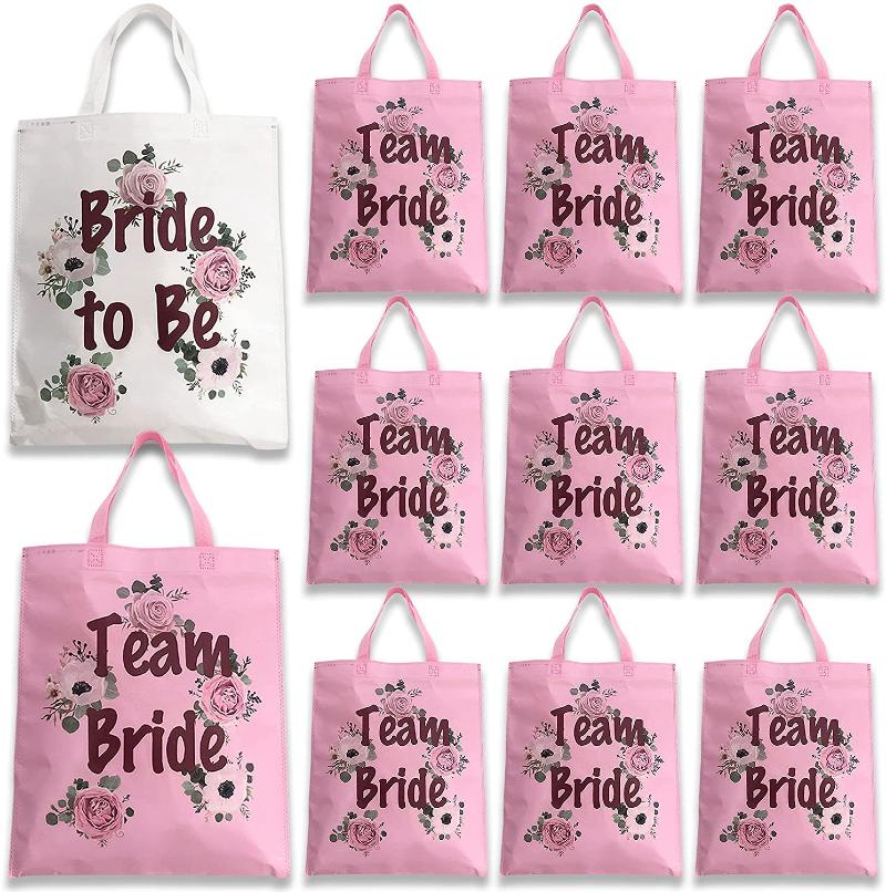 Canvas hen party bags that say team bride and bride to be