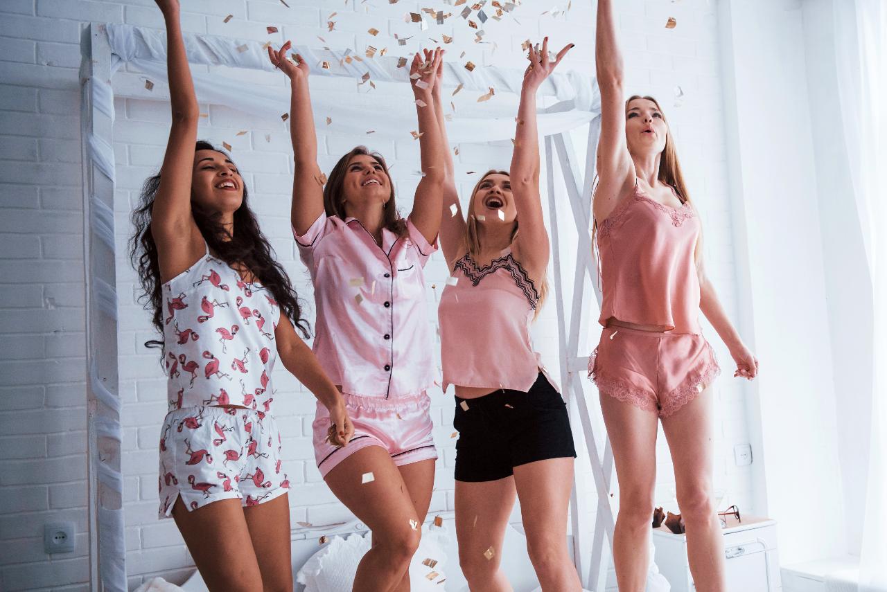 Four women at home for a low key hen party
