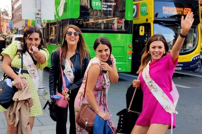 A group of girls taking part in the treasure hunt hen party activity