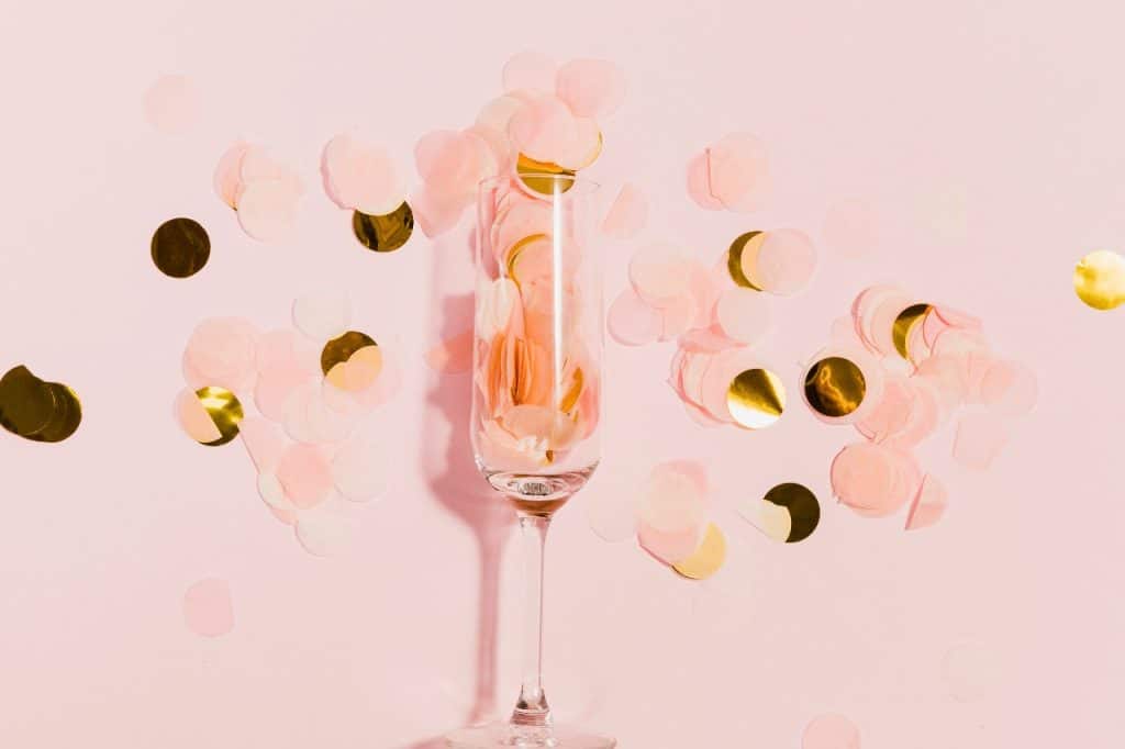 Rose gold hen party champagne with confetti